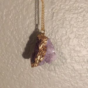 Purple rock crystal necklace.